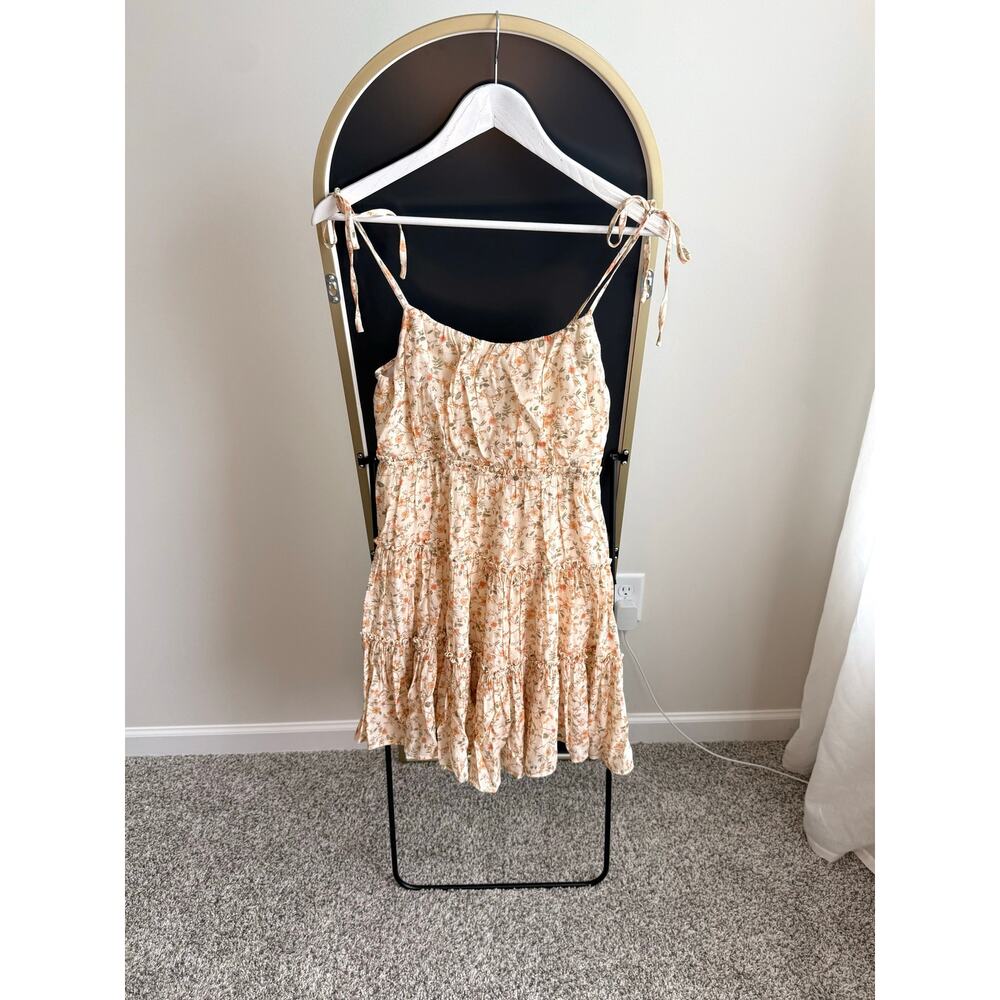 Double lined flowy mini dress by
E+M